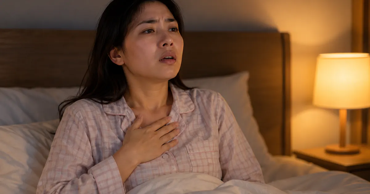 Người ngồi nâng thân trên sau khi bị trào ngược dạ dày khó thở về đêm